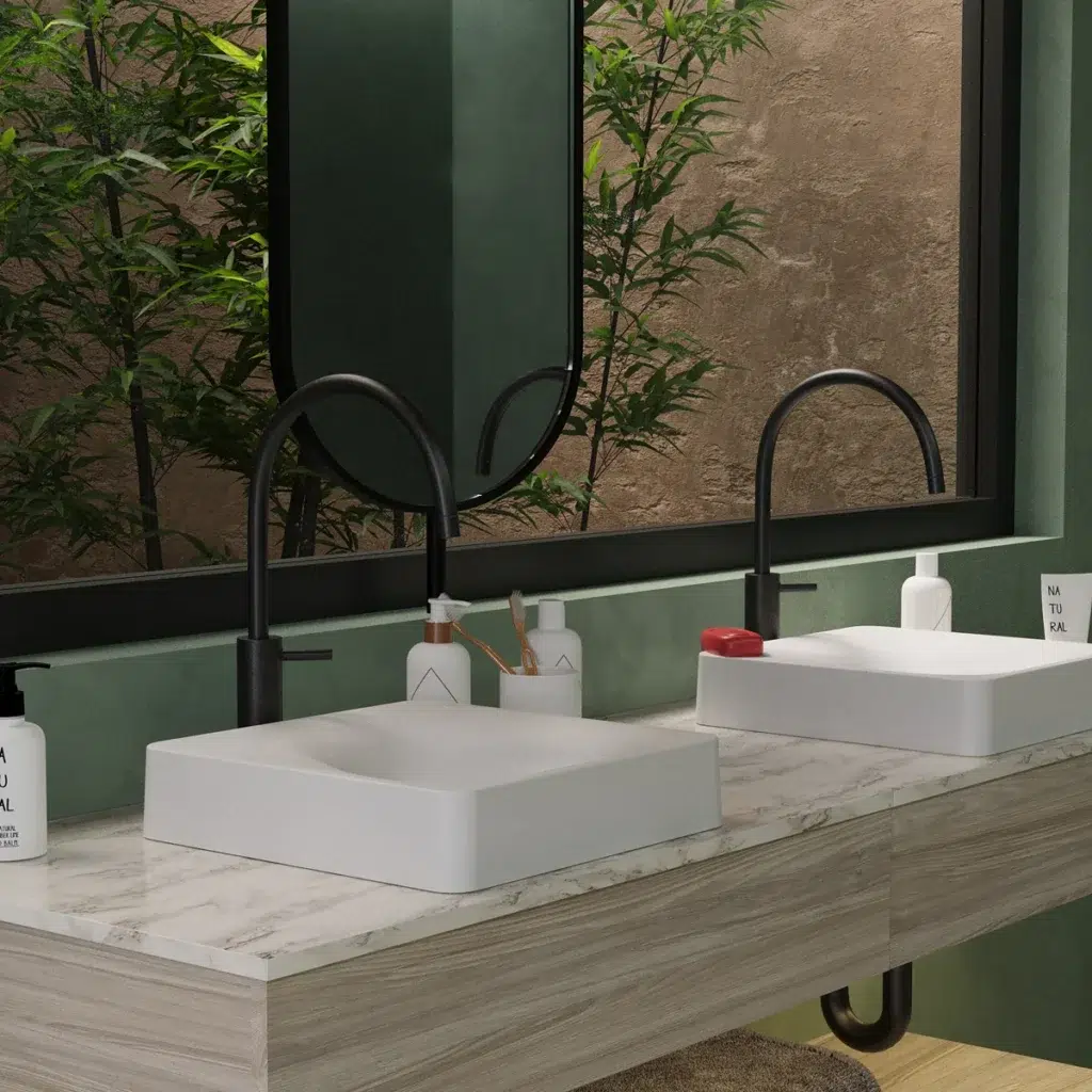 Baño de alta gama para hotel o spa que combina un lavamanos tipo vessel de policuarzo con una tina en fibra de vidrio de Firplak S.A., optimizando las dimensiones reales del espacio con acabados exclusivos.